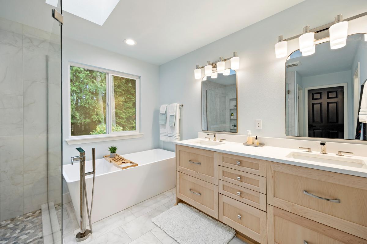 Spa-inspired luxury bathroom remodel in Olympia with walk-in shower and soaking tub